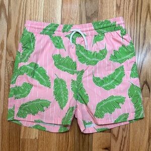 The Beaufort Bonnet Company Pink and Green Leaf Kids Swim Trunks